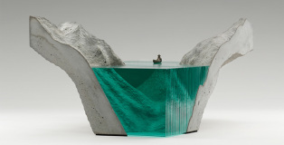 Ben Young - Glass sculptures, The entrance, Laminated clear float glass with cast concrete base and cast white bronze canoe.