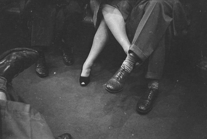 The New York subway, by Stanley Kubrick. Stanley Kubrick. Life and Love on the New York City Subway. Couple playing footsies on a subway. 1946. Museum of the City of New York. X2011.4.10292.90E