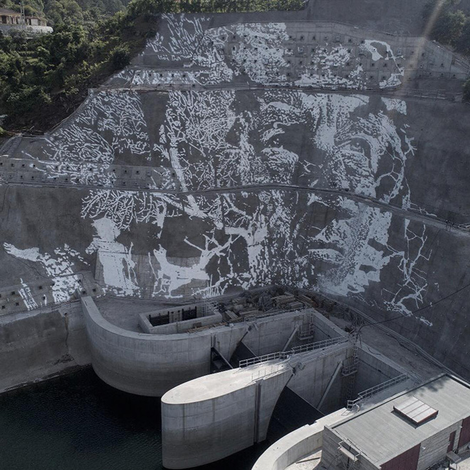 Vhils - Caniçada Dam Project (Vieira do Minho), Portugal. photo credit: © EDP & Pedro Santasmarinas & João Almeida