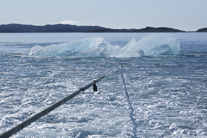 Harvesting ice floating in Nuup Kangerlua, Greenland, for Ice Watch in Paris, 2015. Photo: Jørgen Chemnitz