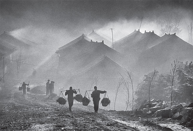 ©Philippe Fatin - In the Mounts of the Moon (series). Misty morning at Baojin village in winter time, Guizhou province, Zhenyuan district China.