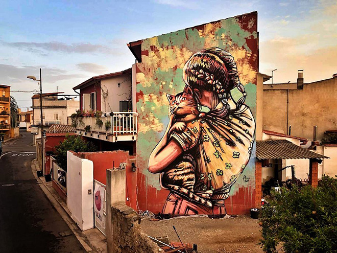 Alice Pasquini – “Incontro”, murale a San Gavino Monreale