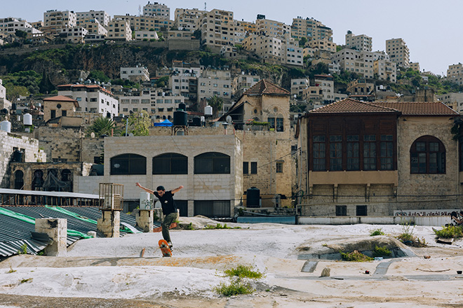 Maen Hammad - LANDING. The artist ollieing atop the roofs of Nablus’ old city.