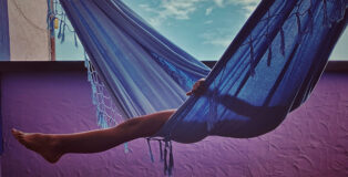 Daniel de Cerqueira (Brazil) - On the Swing of Childhood, Buzios, Rio de Janeiro, Brazil. Shot on iPhone 11. First Place - Children. © IPPAWARDS - 2024 Winners