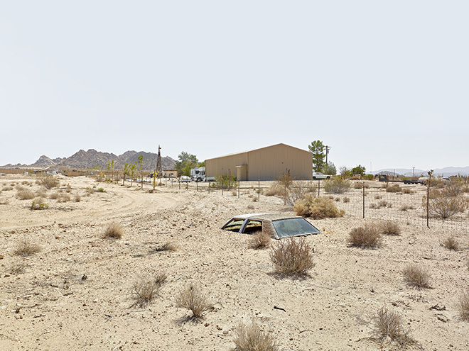 ©Matthew Portch / Courtesy of All About Photo - Buried Car, CA. Series: Lost America