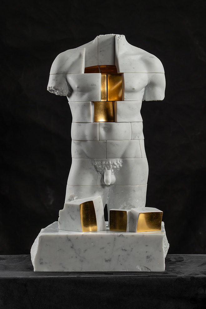 Michal Jackowski - Body Facade Man, 2024, marble gilded with 24k gold leaf, 43x14x29 cm. Photo credit: Paweł-Ławreszuk, courtesy of Cris Contini Contemporary