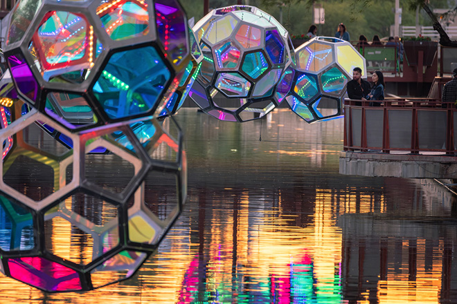 The Urban Conga - Molecules, Arizona Canal, Scottsdale, Arizona (USA). Residents checking out the reflections of Molecules at sunset. Photo credit: Charles Darr