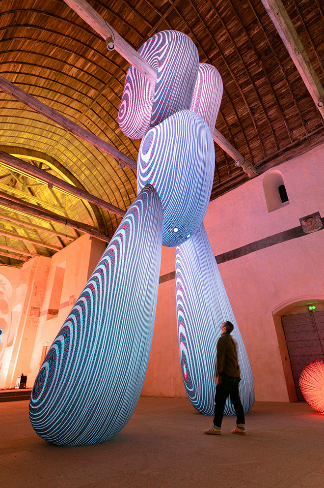 Yogi hanging from the vaulted ceiling, Le centre d'art de Châteaugiron Les 3 CHA. Photo credit: David Zanardi