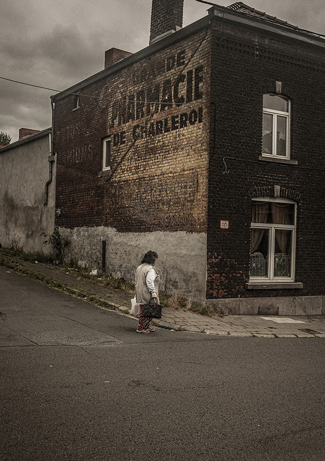 ©Rens Dekker (The Netherlands) / Courtesy All About Photo - Title image: Grande Pharmacie de Charleroi. Title series: Les Carolos: L’Âme du Pays Noir. 3rd place winner AAP Magazine 44: Street